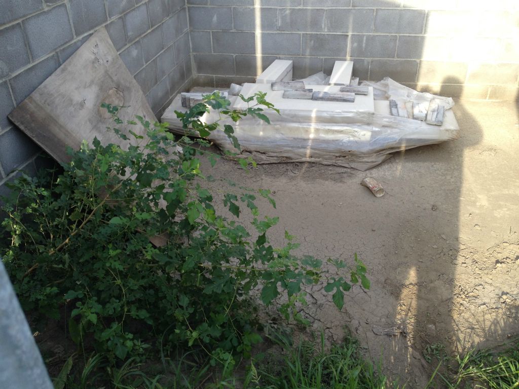 TRASH ENCLOSURE TO BE MODIFIED